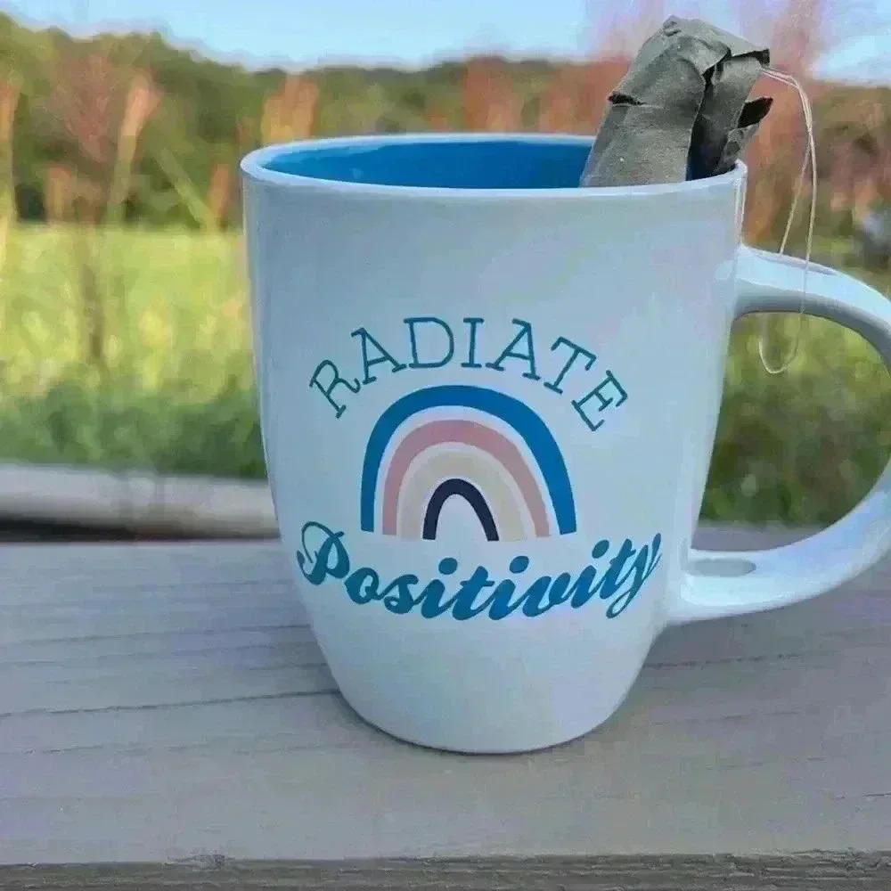 Coffee mug. Radiate positivity. With spoon.